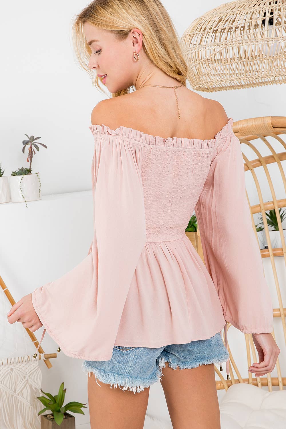 SMOCKED PEPLUM BLOUSE