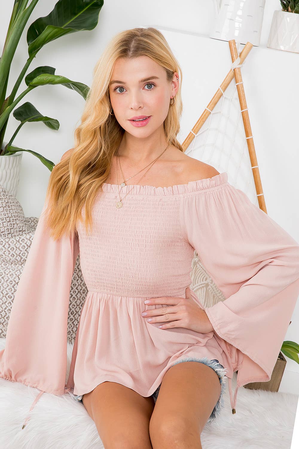 SMOCKED PEPLUM BLOUSE