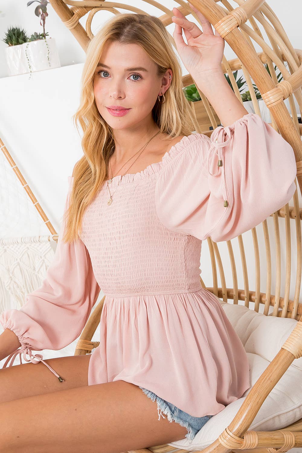 SMOCKED PEPLUM BLOUSE